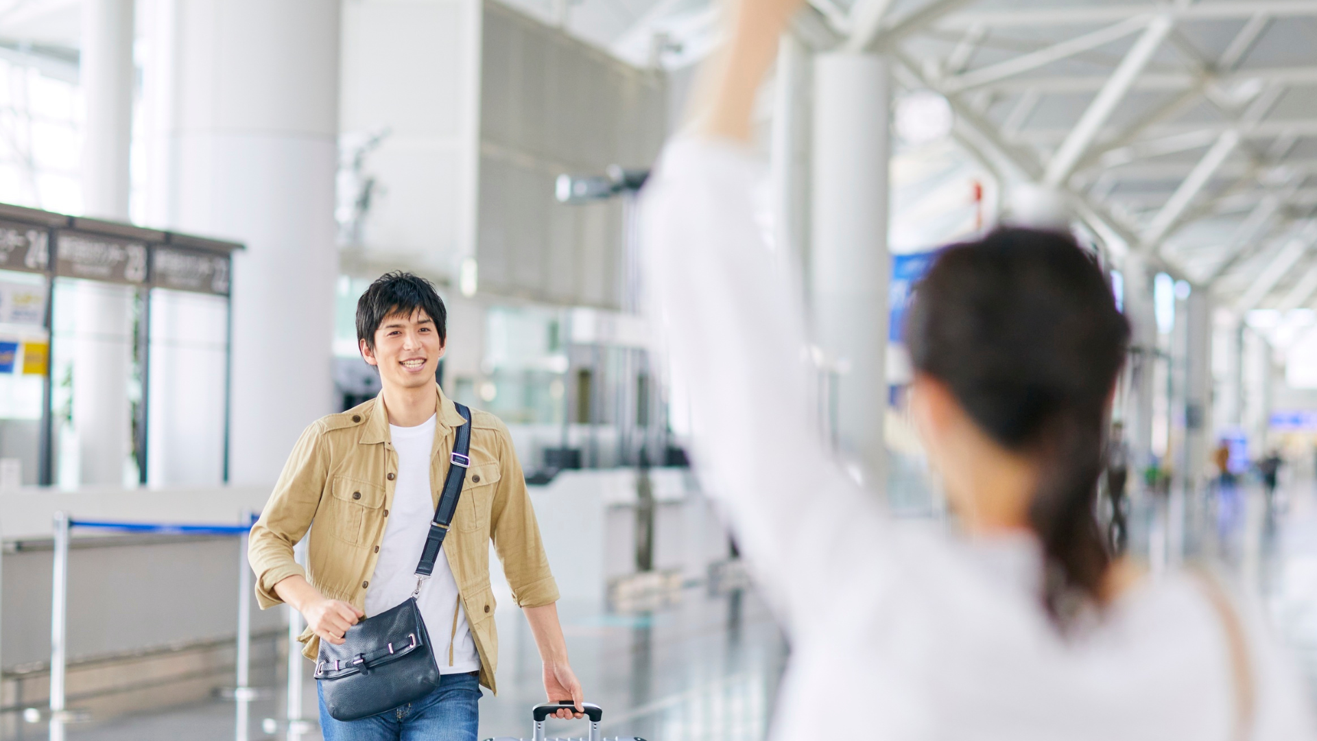 International student welcomed by a local mentor after arriving abroad